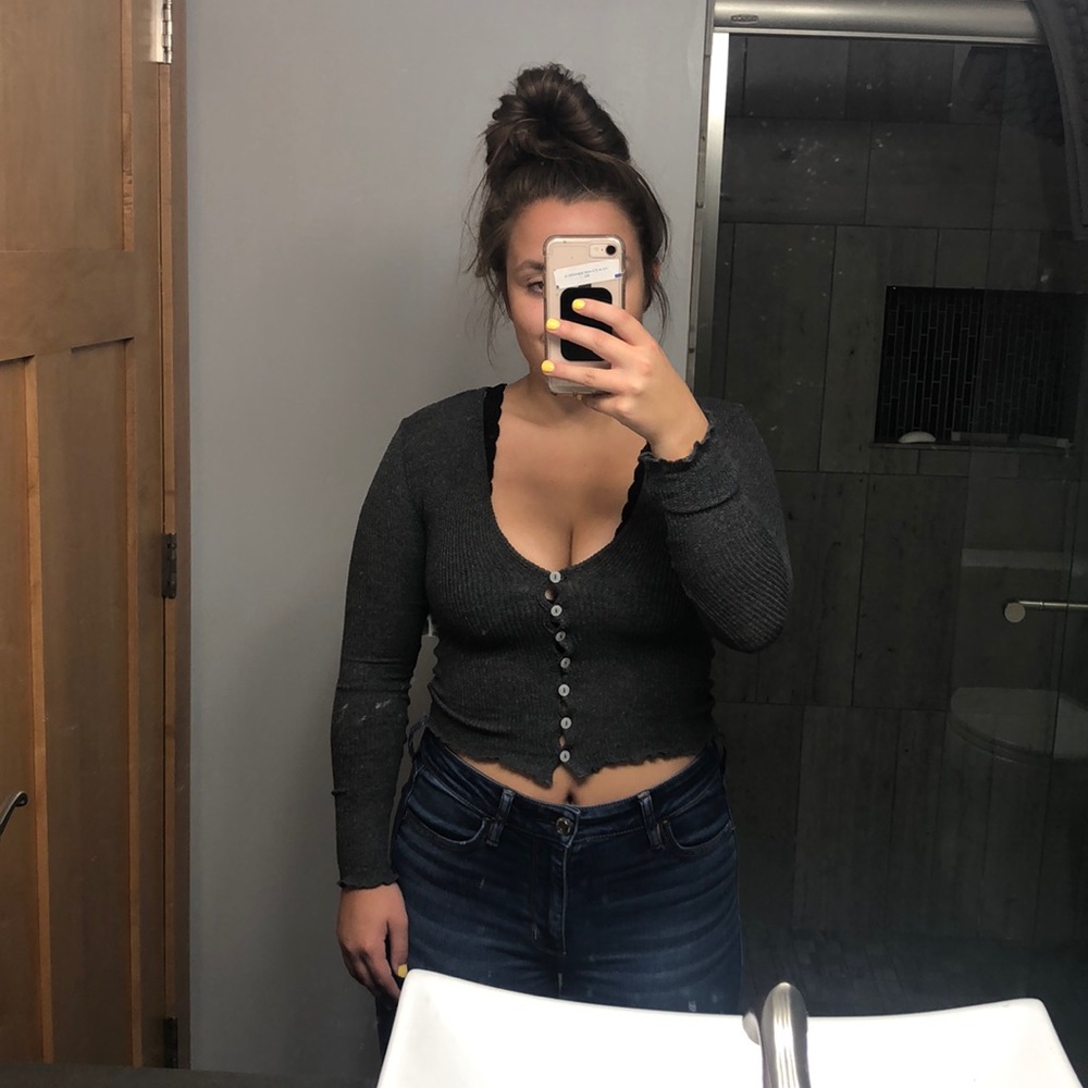 Brand new gray knit long sleeve with buttons.